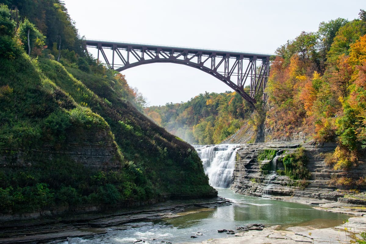 Scenic view of Letchworth State Park gorge with waterfalls and autumn foliage