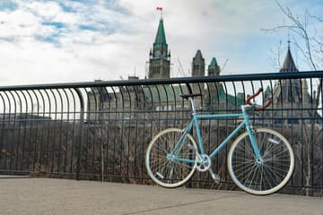 Parliament Hill lit up with Canadian flag decorations during Canada Day celebrations in Ottawa