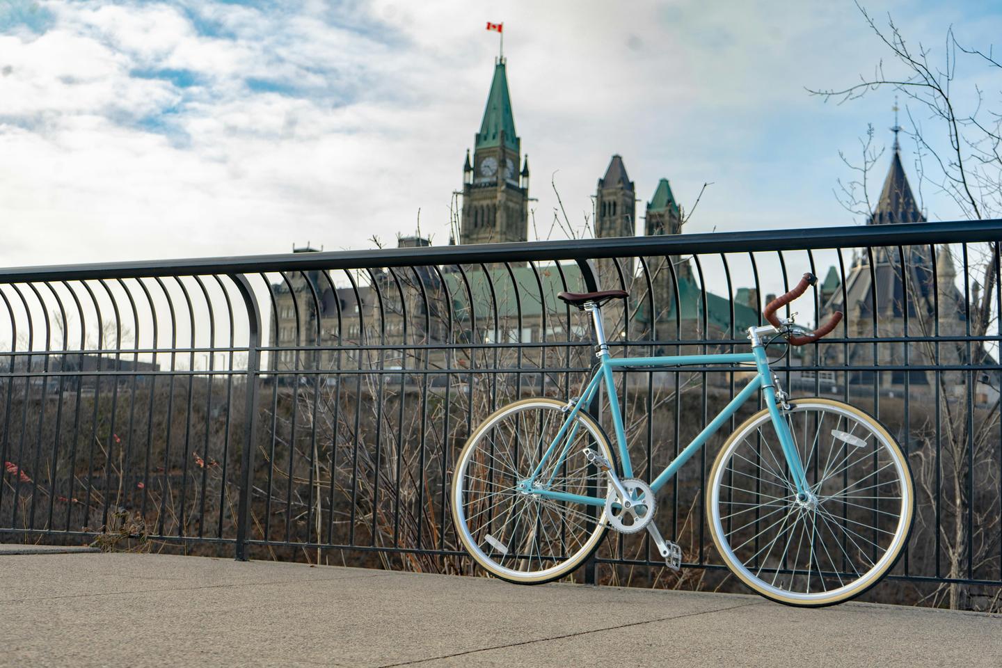 Parliament Hill lit up with Canadian flag decorations during Canada Day celebrations in Ottawa