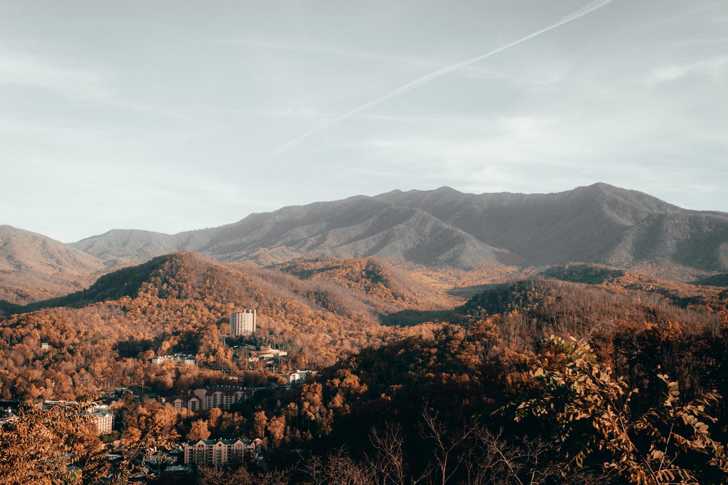 Breathtaking view of Gatlinburg's Smoky Mountains in fall with vibrant foliage and serene scenery