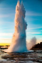 Geothermal hot spring pools with vibrant blue and green colors in Yellowstone National Park
